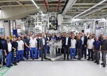 ZF's development and production team celebrate the 1.5 millionth TraXon transmission worldwide roll off the production line at ZF's Friedrichshafen site. Image: ZF.