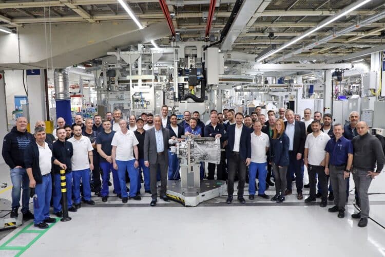 ZF's development and production team celebrate the 1.5 millionth TraXon transmission worldwide roll off the production line at ZF's Friedrichshafen site. Image: ZF.
